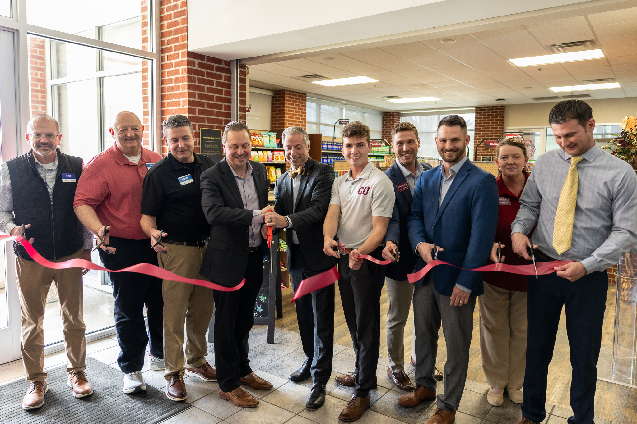 Ribbon Cut photo From left: Mike Smith, Sam Merritt, Barry McCubbin, Josh Harpole, Dr. Joseph Hopkins, Gabe Mauer, Trevor McWhorter, Elijah Coffey, Angela Russell, Jason Keltner