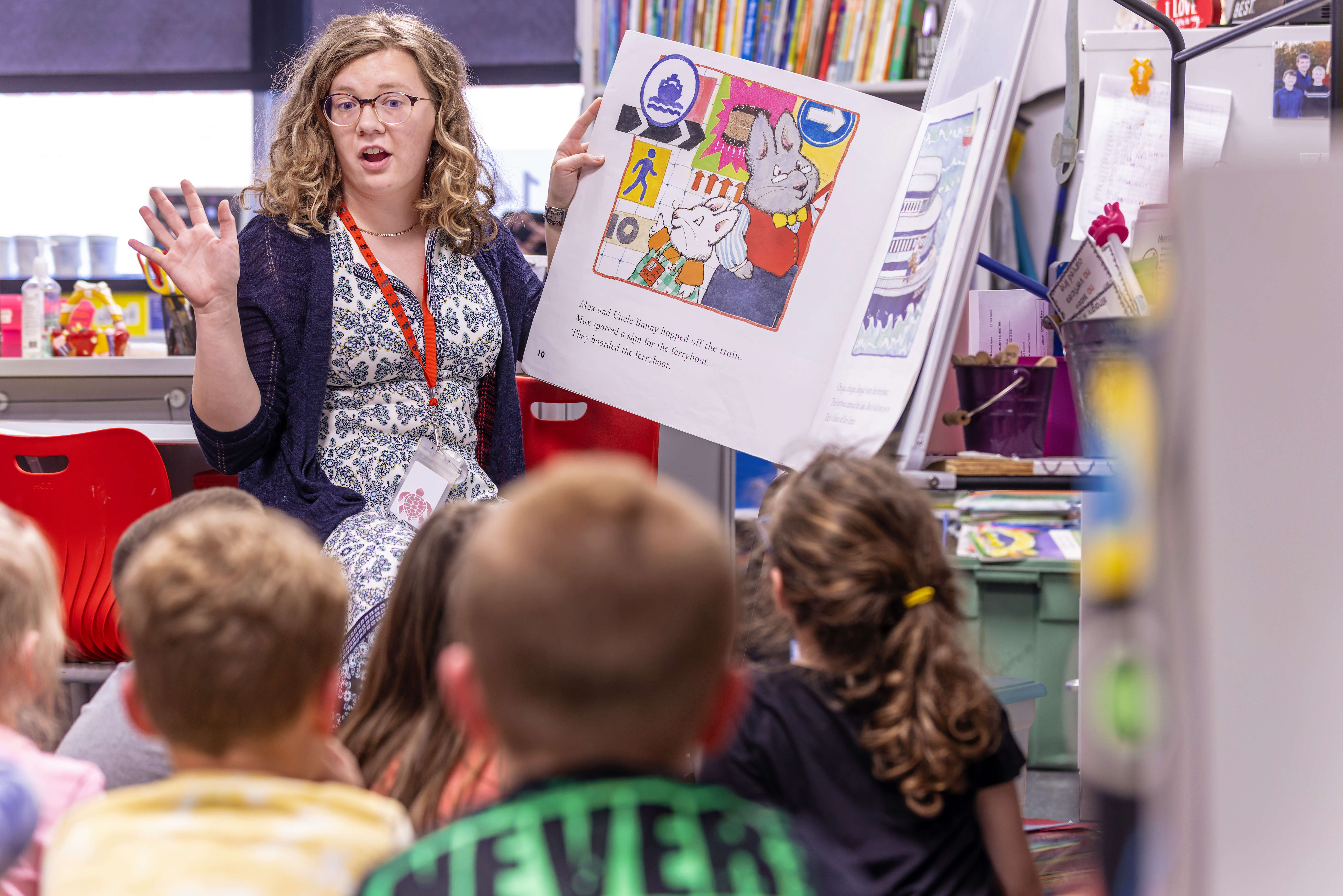 A teacher teaching to a group of students
