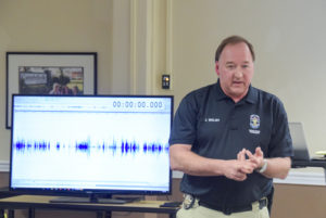 John Welsh, video forensic specialist with the Louisville Metro Police, shows audio enhancement during a session at Campbellsville University. He is the former youth minister at Campbellsville Christian Church. (CU Photo by Luke Young)
