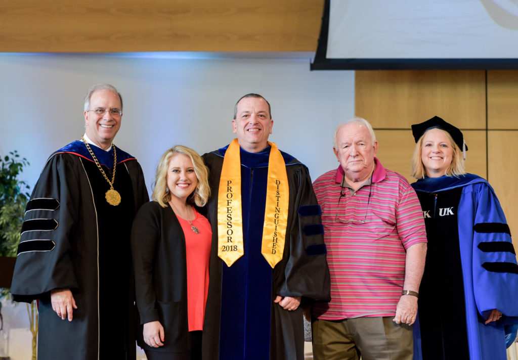 From left: Dr. Michael V. Carter, Tiffany Early, Dr. Joe Early Jr., Dr. Joe Early Sr. and Dr. Donna Hedgepath congratulate Early on receiving the Distinguished Faculty Award. (Campbellsville University Photo by Joshua Williams)