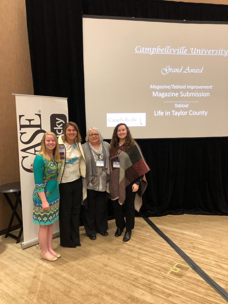 Campbellsville University staff members accept awards at the annual CASE conference. From left are: Amber Meade, communications assistant; Dr. Laurel Raimondo Martin, president of CASE Kentucky; Joan C. McKinney, director of communications; and Alexandria Swanger, communications assistant. (Photo provided by Joan C. McKinney)