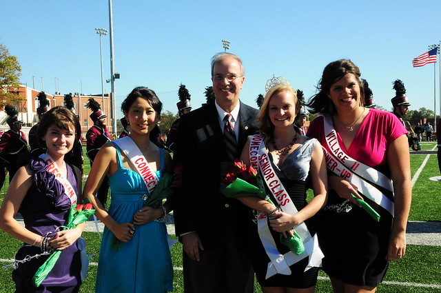 Katie Kelien was crowned Homecoming Queen posting with Dr. Michael Carter and other candidates