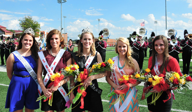 Mary Kate Rogers poses as queen with the other candidates