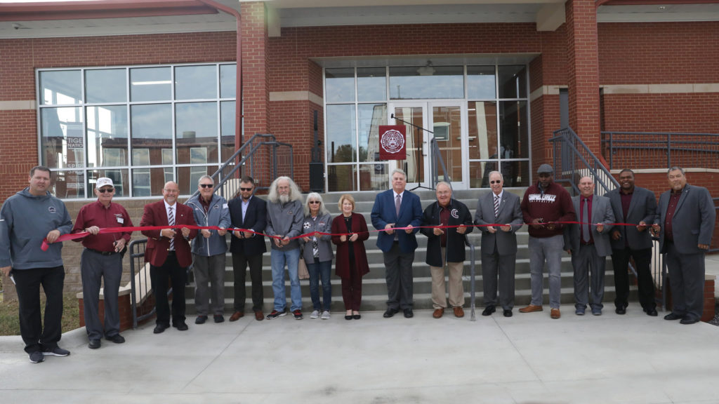Benji Kelly (VP for Development), BJ Senior (Board of Alumni Director), Rusty Hollingsworth (VP for Student Services and Athletics), Keith Spears (VP for Communications and Assistant to the President), Pieter De Griez (VP and co-owner, Blevins Construction), Paul Hert (Honorary Alumni), Janet Hert (Honorary Alumni), Mrs. Debbie Carter (First Lady of CU), Barry Blevins (President, Blevins Construction), Jim Perry (Alumnus), Dr. Michael V. Carter (President of CU), David Cozart (Alum and Board of Trustee), Jim Hardy (Director of Athletics, Perry Thomas (Football Head Coach), Eric Graves (Assistant Athletics Director).