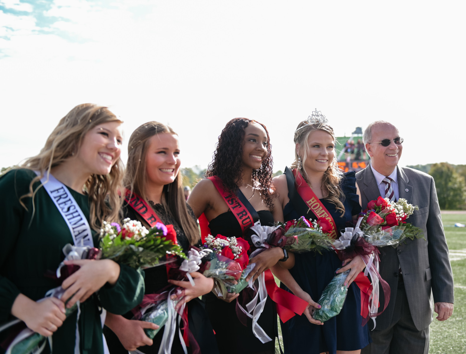Savannah Gregory, representing FCA, second from right, was crowned Campbellsville University's 2019 Homecoming Queen. Dr. Michael V. Carter, president, is at far right. From left are: Ali Flaherty, freshman attendant; Hannah Kennedy, second runner-up, representing the Office of University Communications; Krystan Armstrong, first runner-up, representing the Black Student Association. (Campbellsville University Photo by Joshua Williams)