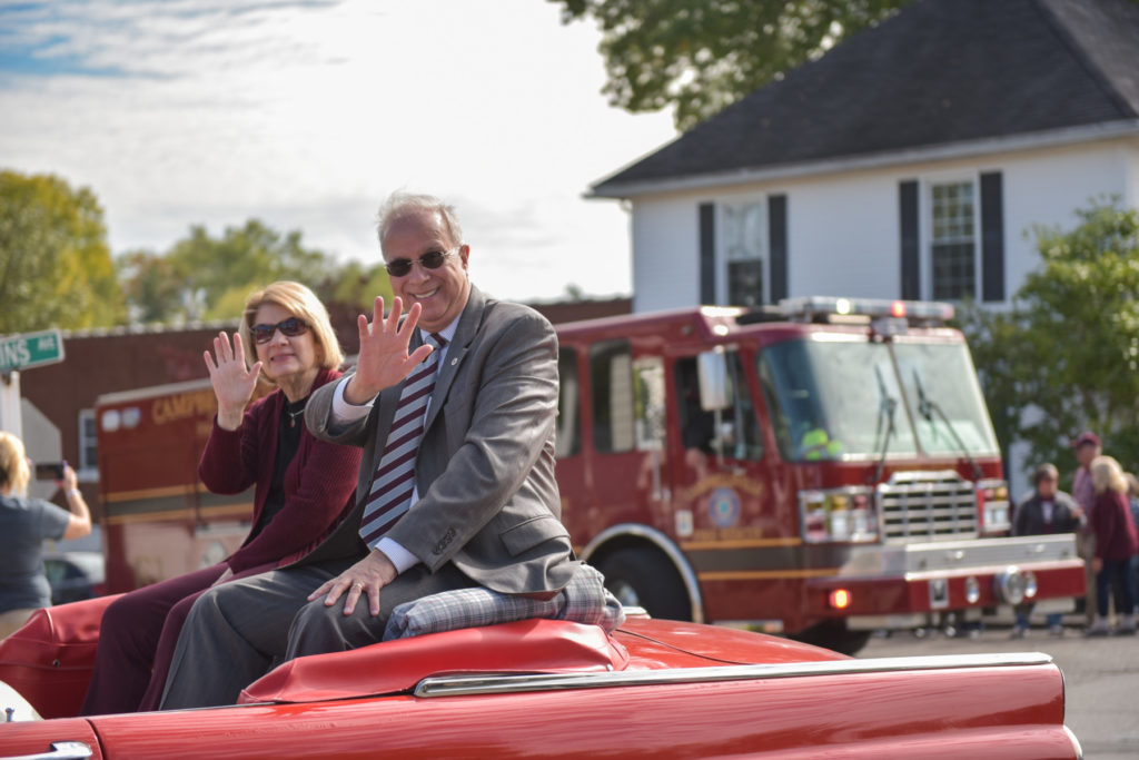 Debbie Carter, first lady of Campbellsville University and Dr. Michael V. Carter, president, ride in a car owned by Al Hardin at the Homecoming parade.(Campbellsville University Photo by Whitley Howlett)