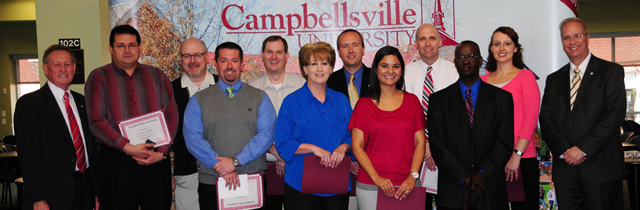 Campbellsville University employees honored for 10 years of service include, with Dr. Frank Cheatham, vice president for academic affairs, far left, and Dr. Michael V. Carter, president, far right, from left: Front row – Derek Port, Donna Wilson, Faun Crenshaw and Dr. Sunny Onyiri. Back row – Hermano J. De Queiroz, Jim Woolums, Dr. Chris Bullock, Tim Judd, Kevin Propes and Kellie Vaughn. (Campbellsville University Photo by Christina Kern)