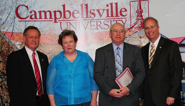 Honored for 20 years of service at Campbellsville University from left, with Dr. Frank Cheatham, vice president for academic affairs, far left, and Dr. Michael V. Carter, president, far right, include: Dr. Sarah J. Stafford and Dr. Vernon Roddy. (Campbellsville University Photo by Christina Kern)