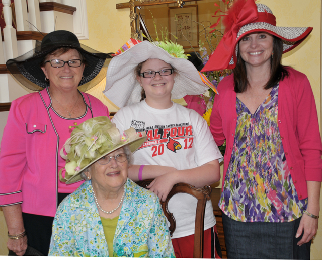 Campbellsville University alumni Betty Porter, left, opened her Mt. Washington, Ky. home to friends of CU for the second annual Derby Hat Preview. She is joined in this four-generation photo by her mother, Alene Wolford, seated, by her daughter at right, Bullitt County District Judge Jennifer Porter, and in center, by her granddaughter, Jennifer’s daughter, Isabella Griffee. (Campbellsville University Photo by Linda Waggener)