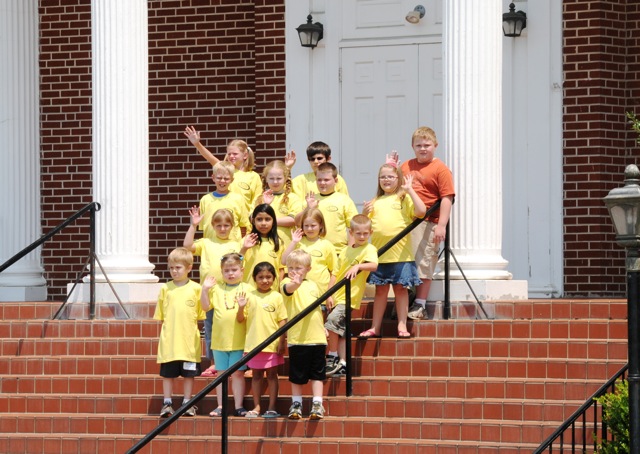 Albany Kids College, grades one through four, are pictured on the steps of the Albany First Baptist Church. Unless noted otherwise, all students are from Clinton County. The students in this group are, first row, from left: Bode Copeland, Jaden Mullins, Nikki Dominguez and Aiden Horner. Row two: Annessa Roysdon, Sidney Dominguez, Clarissa Gregory and Cyrus Vincent from Burkesville. Row three: Marcus Moons, Rhiannon Lovelace, Coulan Beck and Hannah Wade. Row four: Delilah Talbott, William Chaplin and Ethan Horner. (CU Photo by Linda Waggener)