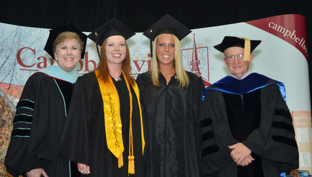 Students from Campbellsville University's School of Education receiving 8-12, secondary education degrees were from left with Dr. Brenda Priddy, dean of the School of Education, far left, and Dr. Robert VanEst, professor of education, far right: Courtney Claywell and Shelby Pfeiffer. (Campbellsville University Photo by Joan C. McKinney)