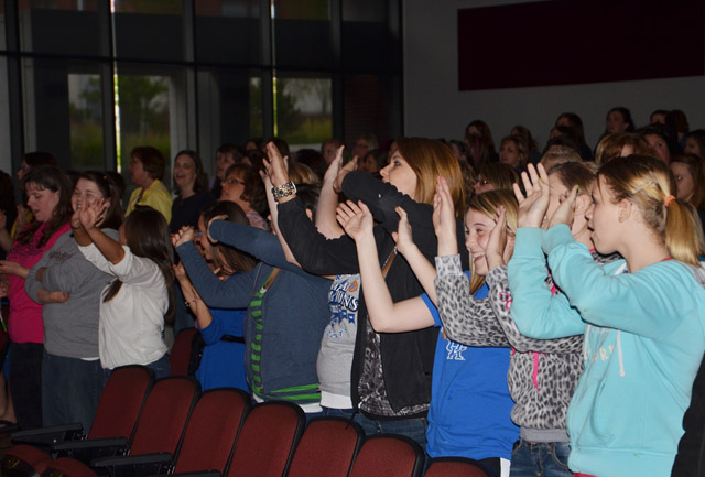 A group of Acteens worship at Exalt, a conference for teen girls sponsored by Kentucky Woman's Missionary Union held at Campbellsville University. (Campbellsville University Photo by Matthew Schmuck)