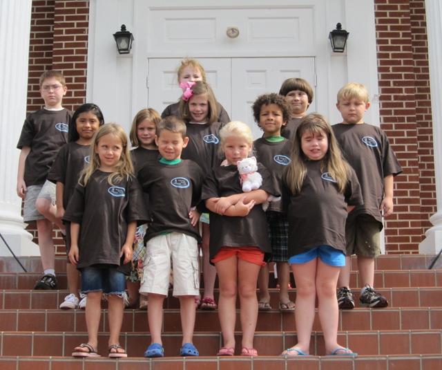 Campbellsville University’s Technology Training Center hosted Kids College in Albany, Ky., June 28-July 1. Kids College provides students with opportunities to broaden the scope of their interests and interact with others. Students learned about crafts, cooking, science, books, etc. Students participating from left in the first-fourth grades include from left: Front row – Kana Wade, Ethan Irwin, Cadence Miller and Jaden Mullins, all of Albany. Second row -- Nikki Dominguez, Alleigh Conner, Annie Cross, Braden Stockton and Aidan Horner, all of Albany. Back row -- Andrew Perdew of Monticello; Rhiannon Lovelace of Albany; and Natalie Elam of Monticello. The Kids College was held at Albany First Baptist Church. (Campbellsville University Photo by Carol Sullivan)