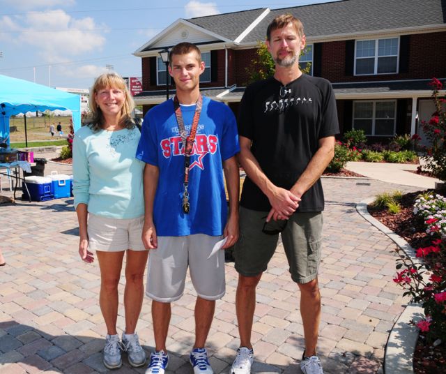 Alex Dapkus of Richmond, a freshman baseball player, arrived on the Campbellsville University campus Saturday morning. His mom and dad, Kathy and Paul Dapkus, pictured on either side of him, helped Alex move into the men’s village residence located directly behind the Tiger Baseball stadium where he will play. (Campbellsville University photo by Linda Waggener)