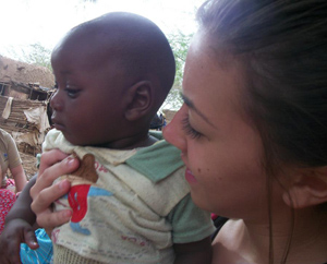 Alexa Moore holds a baby on a mission trip to Niger Africa. This was her first mission trip. (Photo submitted)