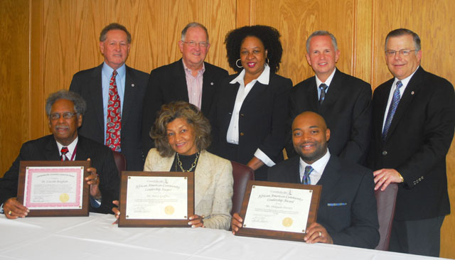 Receiving awards from Campbellsville University were from left: Front row – Dr. Lincoln Bingham, Dr. Betty Griffin and Delquan Dorsey. Others making the presentation and in attendance at the presentation were from left: Back row – Dr. Frank Cheatham, Dr. Jay Conner, Ava Bingham Reynolds, Otto Tennant and the Rev. John Chowning. (Campbellsville University Photo by Joan C. McKinney)