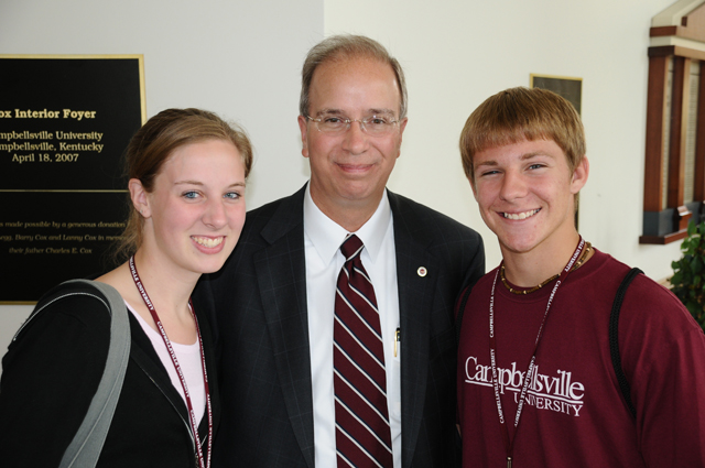 Dr.Michael V. Carter, CU president, welcomes freshmen from Cadiz, Ky., Laura BethBaggett, left, and Shane Banks. They were in attendance at the first Service ofDedication held in Ransdell Chapel to welcome and induct the Class of 2013.(Campbellsville University photo by Andre Tomaz)
