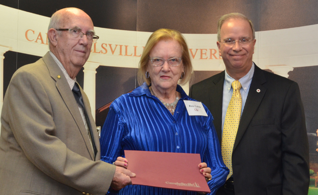 Everett and Rose Colvin are acknowledged for their establishment of their restricted scholar- ship by Campbellsville University president Michael V. Carter. (Campbellsville University  Photo by Joan C. McKinney)