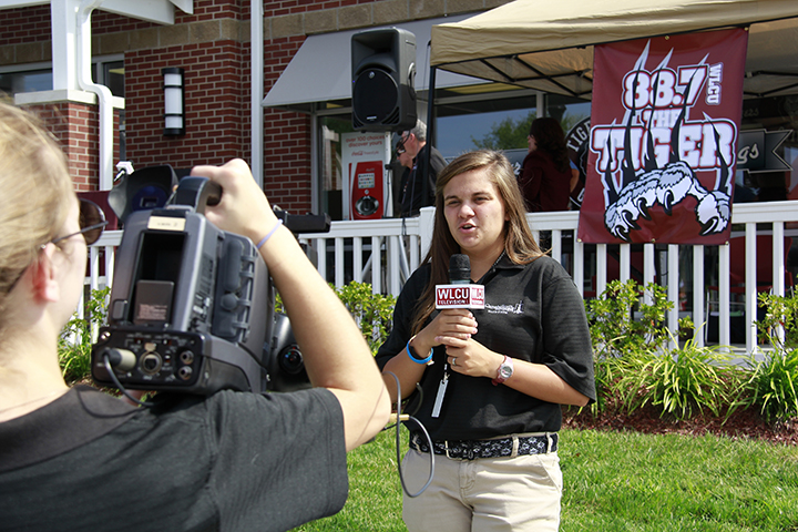  Covering the unveiling of 88.7 The Tiger is Cortni  Cruse, mass communication student. (Campbellsville  University Photo by Rachel DeCoursey)