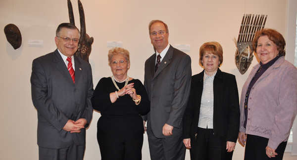 Margery Mathis Henderson, second from left, recently held an art exhibit at Campbellsville University of African artifacts gathered when she and her husband, the late Glenn Henderson, were missionaries. Henderson, who lives in Burkesville, Ky., is shown with, from left, John Chowning, vice president for church and external relations and executive assistant to the president at Campbellsville University, who is a native of Cumberland County; Henderson; Dr. Michael V. Carter, president of Campbellsville University; Carter’s wife, Debbie, and Sue Stivers, a graduate of CU, friend of Henderson and director of the Columbia/Adair County Economic Development Authority. Henderson is a member of Burkesville Baptist Church and is the sister of Dr. Don Mathis, president of the Kentucky Baptist Convention. (Campbellsville University Photo by Bayarmagnai “Max” Nergui)