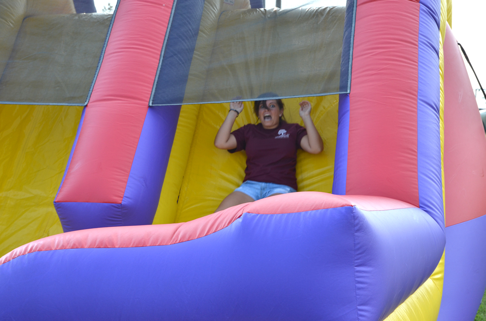 Annie Schakat had a wild times on the blow-up slide. (Campbellsville University photo by Drew Tucker)