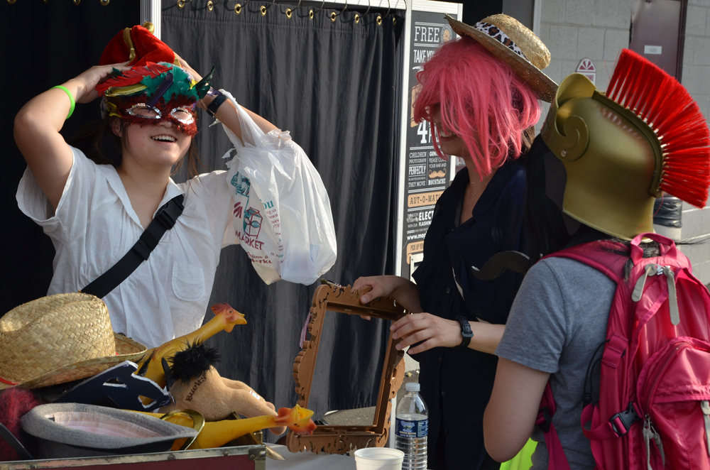 Tomomi Sato (left) is all smiles as she and her friends, Ayami Nakano (center) and Miku Kawaski (right) play dress up. (Campbellsville University photo by Drew Tucker)