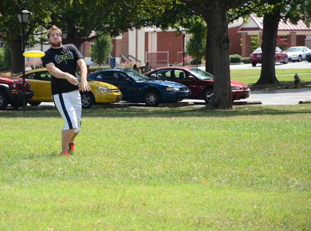 Darryn Litton, a junior from Somerset, Ky., throws a long pass in a game of Ultimate Frisbee  on Stapp Lawn. Students were excited to get the team started again for the fall semester. CU's Flash 7 Frisbee team meets every Sunday at 2 p.m. (Campbellsville University Photo by  Christina Kern)