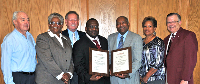 Two leaders of the African-American community were recognized at the Dialogue on Race luncheon. Campbellsville University’s African-American Community Leadership Award was presented to Dr. Eric A. Johnson. The Campbellsville University Racial Recognition Award was given to local leader, the Rev. Michael Caldwell. From left are: Dr. Robert Clark, CU academic vice president and professor emeritus, and board member of Greater Campbellsville United; Yevette Haskins, co-chair of GCU; Dr. Frank Cheatham, CU vice president for academics; Johnson and Caldwell; Wanda Washington, coordinator of GCU; and John Chowning, CU vice president for church and external relations and executive assistant to the president. (Campbellsville University Photo by Linda Waggener)