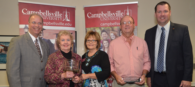 Pat Cave Webster, second from left, and Ronnie Hord, fourth from left, received Distinguished  Alumna and Alumnus Awards, respectively, at Homecoming. From left are Dr. Michael V. Carter, president; Webster; Paula Smith, director of alumni relations; Hord and Benji Kelly, vice president for development. (Campbellsville University Photo by Joan C. McKinney)