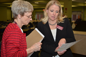 Dr. Patricia Swails, left, board of examiners  chair, professor of education at Oakland City University in Oakland City, Ind., talks with Dr.  Donna Hedgepath, associate professor of education and associate dean, who was NCATE coordinator.  (Campbellsville University Photo by Joan C. McKinney)