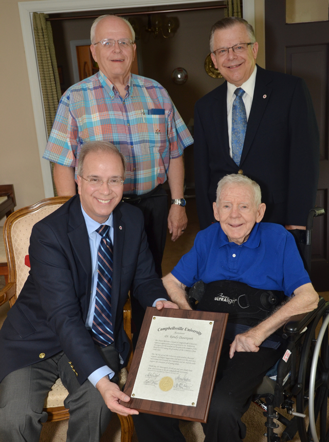 Dr. W.R. “Randy” Davenport, right, president of Campbellsville University from 1969 to 1988, was honored by Dr. Michael V. Carter, current president, for Davenport's leadership in establishing the university's Church Relations Council. Also at the ceremony at Davenport's home were top, from left, Dr. Charles Hedrick, one of the first members of the CRC, and John Chowning, vice president for church and external relations and executive assistant to the president at CU. (Campbellsville University Photo by Joan C. McKinney)