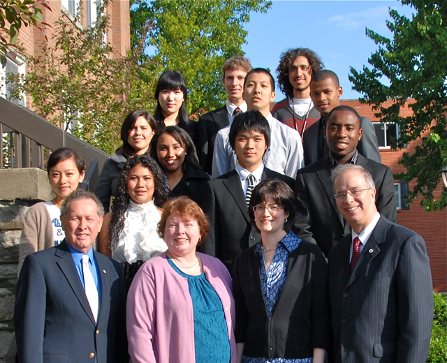 Campbellsville University honored its English as a Second Language (ESL) Institute spring graduates. Pictured with President Dr. Michael V. Carter, front, right, are from left: Front row -- Dr. Frank Cheatham, vice president for academic affairs; Dr. Sandra Kroh, director of ESL Institute and assistant professor; Ardeen Top, assistant director of ESL and instructor; and Carter. Second row -- Jieyun Wang, left; and Evelyn Mendoza. Third row -- Cristina Soares da Silva, Takenori Oue and Joel Komena. Fourth row -- Carolina Rodriguez, Koya Iwasaki Bacari Abdou Elie. Back row -- Haejin Kim, Thomas Lecoffre and Miguel Restrepo. Also in the program but not pictured are: Woo Young Choi, Seung-Hwa Han, Nan Lu, Yusuke Nakanami, Takashi Okuda, Jimmy Ruiz and Ishin Umezu. (Campbellsville University Photo by Linda Waggener)