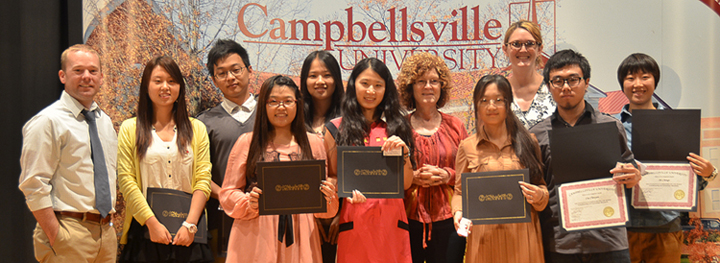 Bejing University of Agriculture English as a Second Language students were honored at a ceremony at Campbellsville University. From left are: Front row – Dongmei Wang, Yijing Shi, Mengchen Xu, Yixin Wang and Chenyang Liu. Back row – Chris Sanders, assistant dean of international education; Yuanqing Cao, Lihe Huang, Maryann Matheny, English as a Second Language endorsement specialist; Andrea Giordano, assistant director of ESL and instructor in ESL; and Chenge Shi. All the students are from China. (Campbellsville University Photo by Drew Tucker)