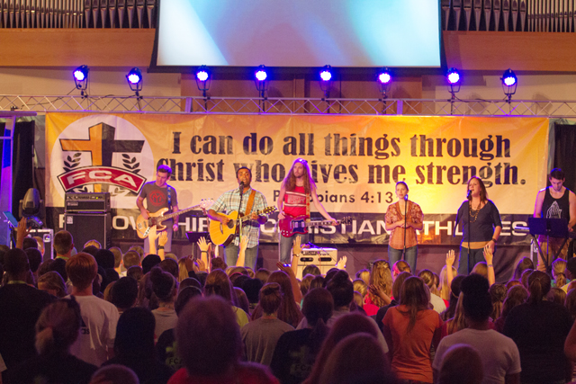 A band plays during the Fellowship of Christian Athletes State Leadership Camp at  Campbellsville University attended by about 550. A total of 149 first-time decisions for  Christ were made among the 7,007 campers on campus this summer. (Campbellsville University Photo by Robert Bender)