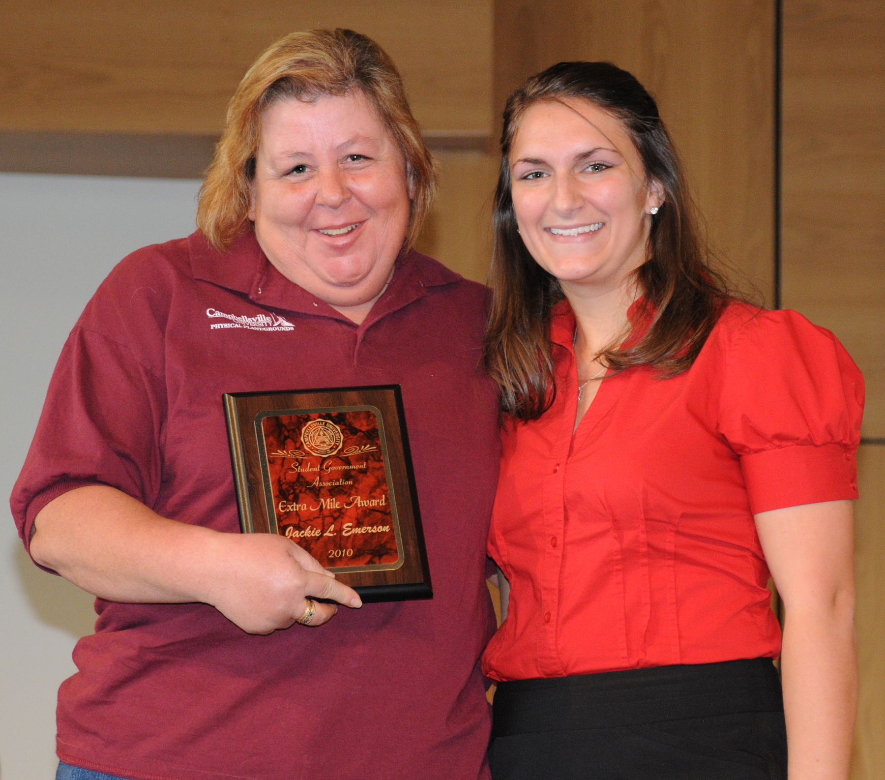 Jackie Emerson, custodian, receives the SGA Extra Mile Award for faculty/staff from Christina Miller, SGA president. (CU Photo by Ashley Zsedenyi)