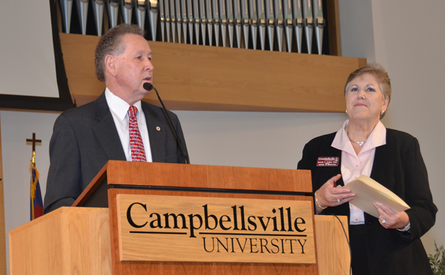 Dr. Frank Cheatham, left, senior vice president for academic affairs, complimented Dr. Brenda Priddy, dean of the School of Education, during the Excellence in Teaching Ceremony. (Campbellsville University Photo by Linda Waggener)