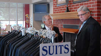 Dr. Bob Gaddis, dean of the School of Music, gets fitted for a suit by Jim Tatum, founder of Suits for Servants. (Campbellsville University Photo by Phil Carlisle)