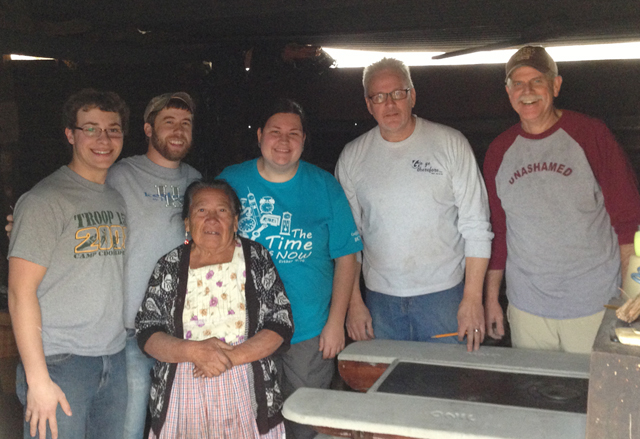 The Guatemala mission team replaced a stove for a widow named Marta, standing in front. The new stove allows for ventilation in her home. From left are: Lucas Pepper, a sophomore of Hodgenville, Ky.; Trent Creason, 2008 CU alumnus; Marta; Charity Powell, graduate student and 2007 CU alumnus; Dave Walters, vice president for admissions and student services; and Ed Pavy, director of campus ministries.