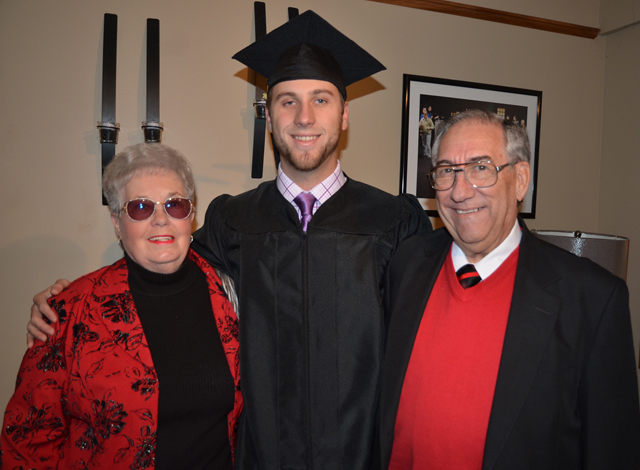 Tyler Hardy, center, was congratulated by his grandparents Peggy, left, and Al Hardy, former  long-time employee at CU, before the pinning ceremony. (Campbellsville University Photo by Joan C. McKinney)