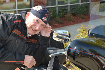 Dr. E. Bruce Heilman gets ready to leave from CU on his motorcycle April 23. (Campbellsville University Photo by Joan C. McKinney)