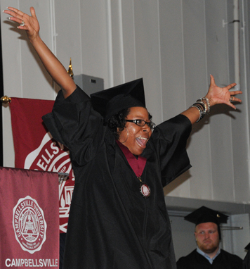 Hillary Wright of Springfield, Ky. is happy as she graduates today in Campbellsville University’s Powell Athletic Center. (Campbellsville University Photo by Ashley Zsedenyi)
