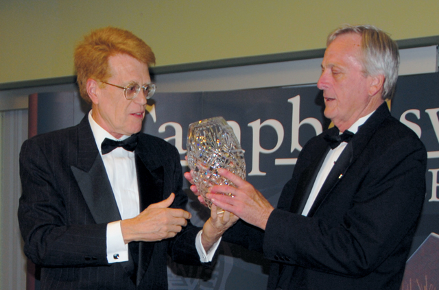 Terry Black, right, of Louisville, was presented the first CU Derby Rose Gala Award by Steve Horner. (CU Photo by Linda Waggener)