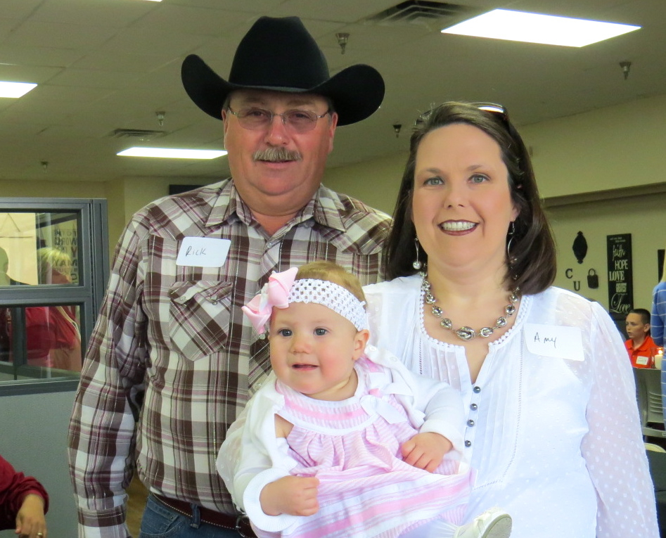 Amy and Rick Marcum, and their little girl, Adyson, 8 months old, were at Campbellsville University's Larry and Beverly Noe Somerset Center graduation celebration on April 25. Amy, who will be getting her social work degree, said Adyson will be glad her mom is getting out of school. (CU photo by Linda Waggener)