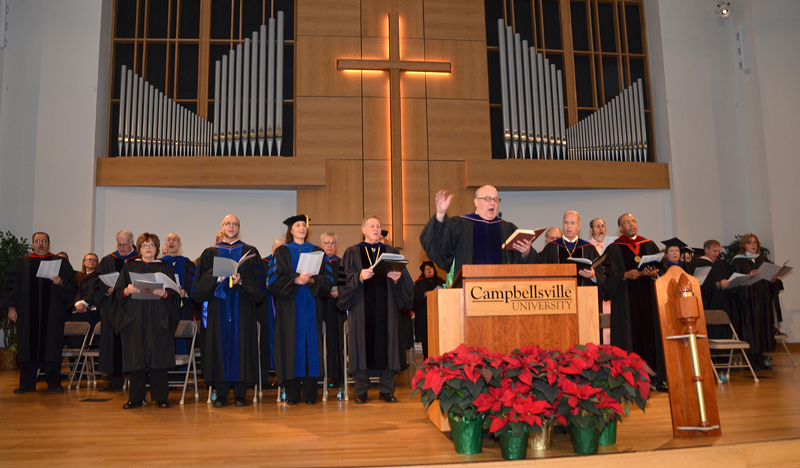 Dr. C. Mark Bradley, professor of music, leads the music during both commencements. (Campbellsville University Photo by Joan C. McKinney)