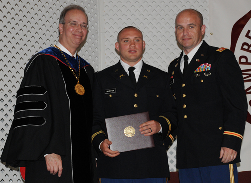 Jairus Robert York Murton of Campbellsville was commissioned as a second lieutenant in the United States Army at Campbellsville University’s commencement by Lt. Col. Jason T. Caldwell of Western Kentucky University. At far left is Dr. Michael V. Carter, president of CU. (Campbellsville University Photo by Ashley Zsedenyi)