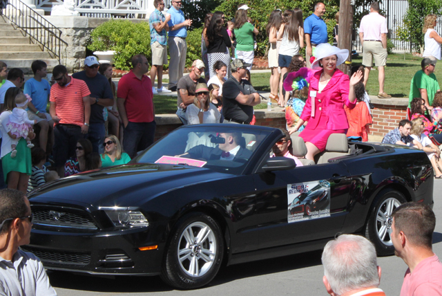 Jessica Blakeman, Campbellsville University's Valentine Queen, rides in the parade as she  competes for the Kentucky Mountain Laurel Festival Queen in Pineville, Ky. 