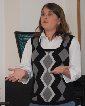Dr. Jill Day teaches a sports law class at     Campbellsville University. Her research on     childhood obesity helped secure a grant for     Clay County. (Campbellsville University     Photo by Piao Yu)