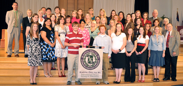 Campbellsville University’s Alpha Epsilon Omicron Chapter of Kappa Delta Pi was charted with 43 students and 11 faculty members initiated at a recent ceremony. From left are: Front row – Lucas Arnold, Alex Young, Alex Morgan, Laura Slack, Whitney Smyser, Dr. Donna Irwin and Dr. Bill Stout. Second row – Andrea Fielding, Amber Jinnett, Brittany Hahn, Lydia Adcock, Colleen Gregg, Angelique Janes, Savannah Knopp, Kathy Maynard, Ester Middlekauff, Melinda Murton, Dottie Davis and Norma Wheat. Third row – Laura Mann, Caitlin Smith, Melanie Arms, Vanessa Devers, Teresa LoPiccolo, Christy Spurling, Amber Wimsatt, Cheris Young and Dr. Sam Melloy. Back row – Chuck Adams, Dr. Beverly Ennis, Anne Edelen, Dr. Frank Cheatham, Dr. Carol Garrison, Dr. Brenda Priddy, Kathleen Anderson, Lindsay Atwood, Carolyn Bedford, Lauryn Cox, Andrea Sanders, Nikki Rice, Terri Unseld and Jacqueline Willoughby. (Campbellsville University Photo by Bayarmagnai “Max” Nergui)