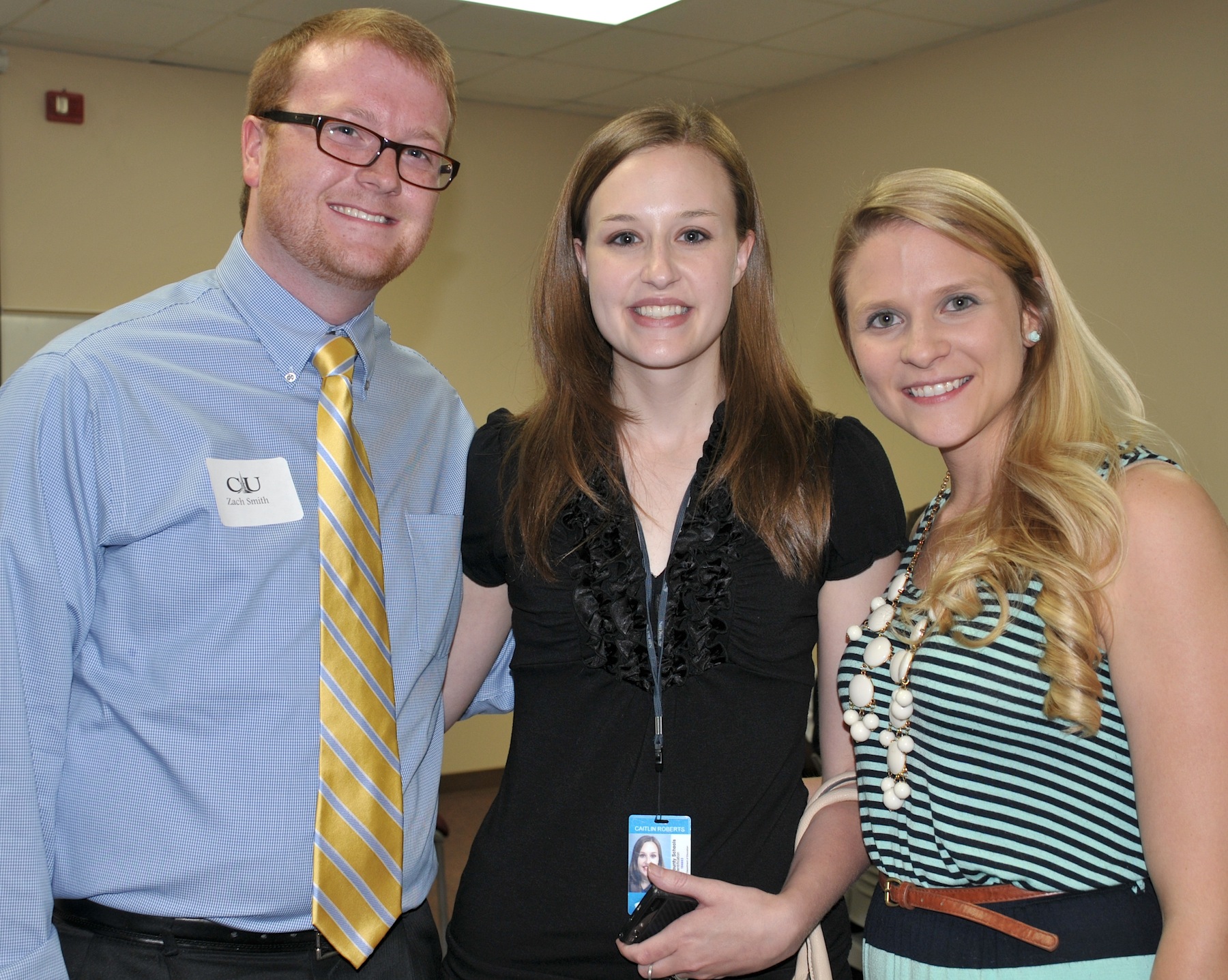 CU alumni in attendance at the May 8 Campaign dinner were, from left: Zach Smith, left, a 2013 graduate and admissions counselor; with his sister Cait Roberts, center, and Megan Massey who was her roommate and 2010 fellow graduate. (Campbellsville University Photo by Linda Waggener)