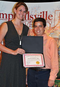  Luis Gutierrez, right, receives the  outstanding ESL student award from Andrea  Giordano, assistant director of ESL at CU. (Campbellsville  University Photo by Christina L. Kern)